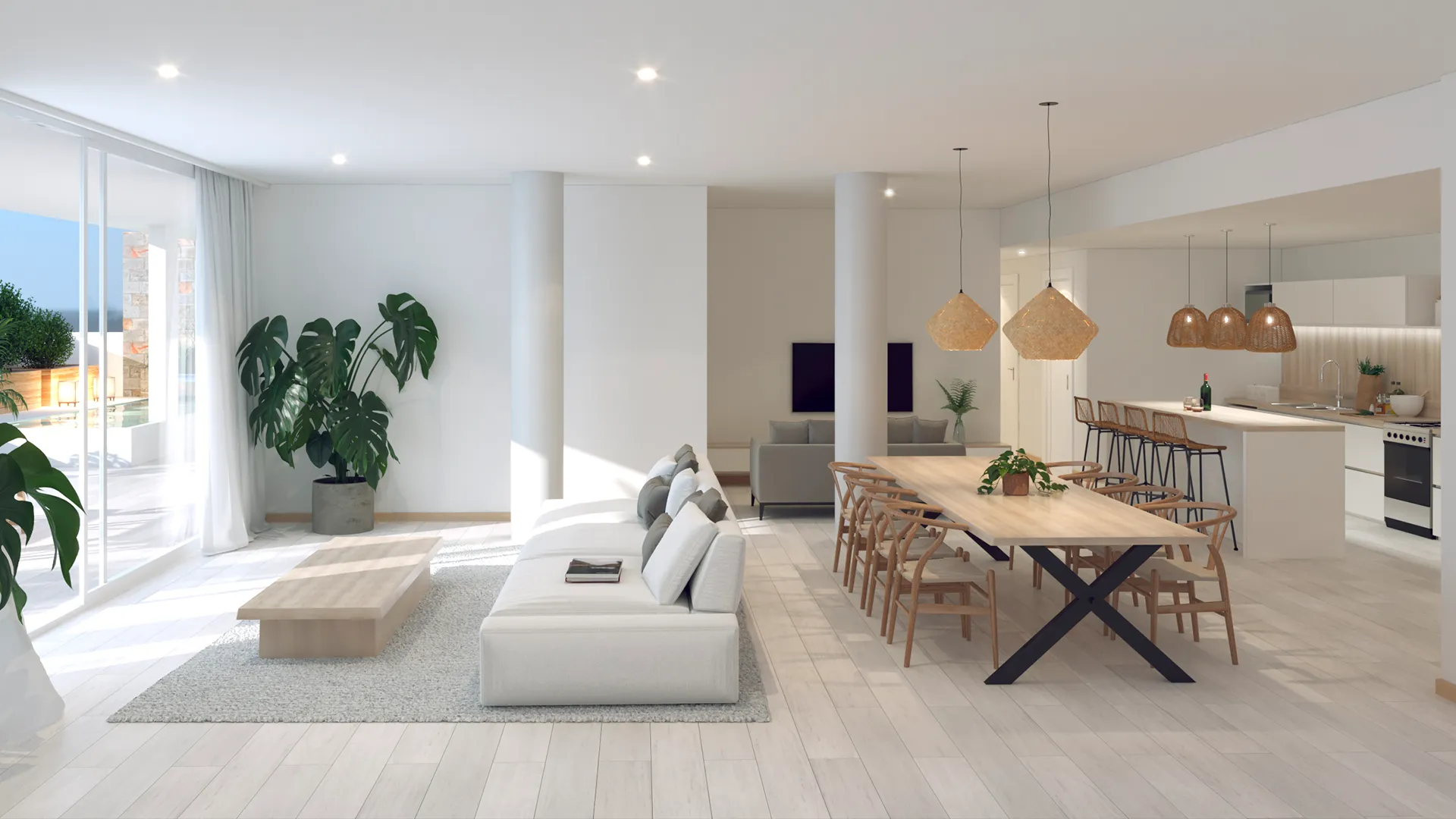 render del interior de los departamentos de Terrazas Bourdieu dónde se ve un espacio living amplio con un sillón, cocina y a salida a un balcón